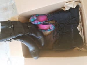 box of duplicate shoes