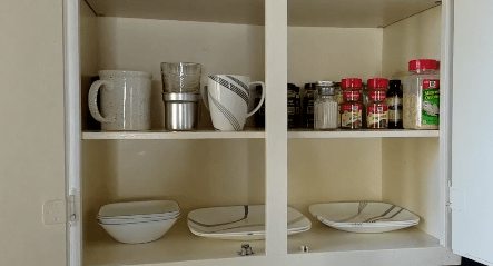 minimalist kitchen cabinet with reduced number of dishes