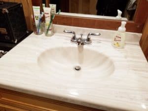 minimalist decluttered bathroom counter