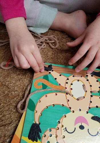 adding stickers to string art